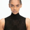 Bodysuit mit hohem Ausschnitt in Schwarz Bodysuit mit hohem Ausschnitt in Schwarz