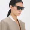 Geformte Sonnenbrille aus Metall und Acetat mit flachem Oberteil Geformte Sonnenbrille aus Metall und Acetat mit flachem Oberteil