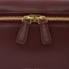 Vanity Crossbody aus burgunderrotem Leder Vanity Crossbody aus burgunderrotem Leder
